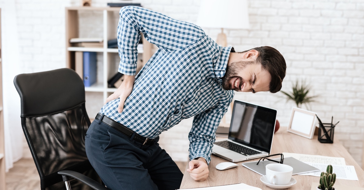 man-has-sore-back-he-keeps-his-hands-waist