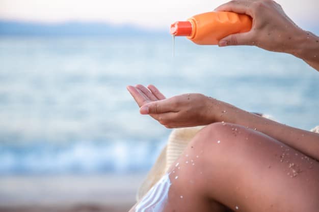 woman-applies-sunscreen-body-part-sun-protection-concept_169016-8696