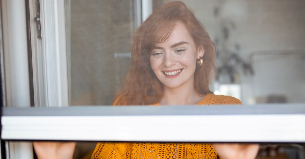 woman-hand-hold-retractable-pleated-insect-screen-holder-open-close-window-mosquito-nets