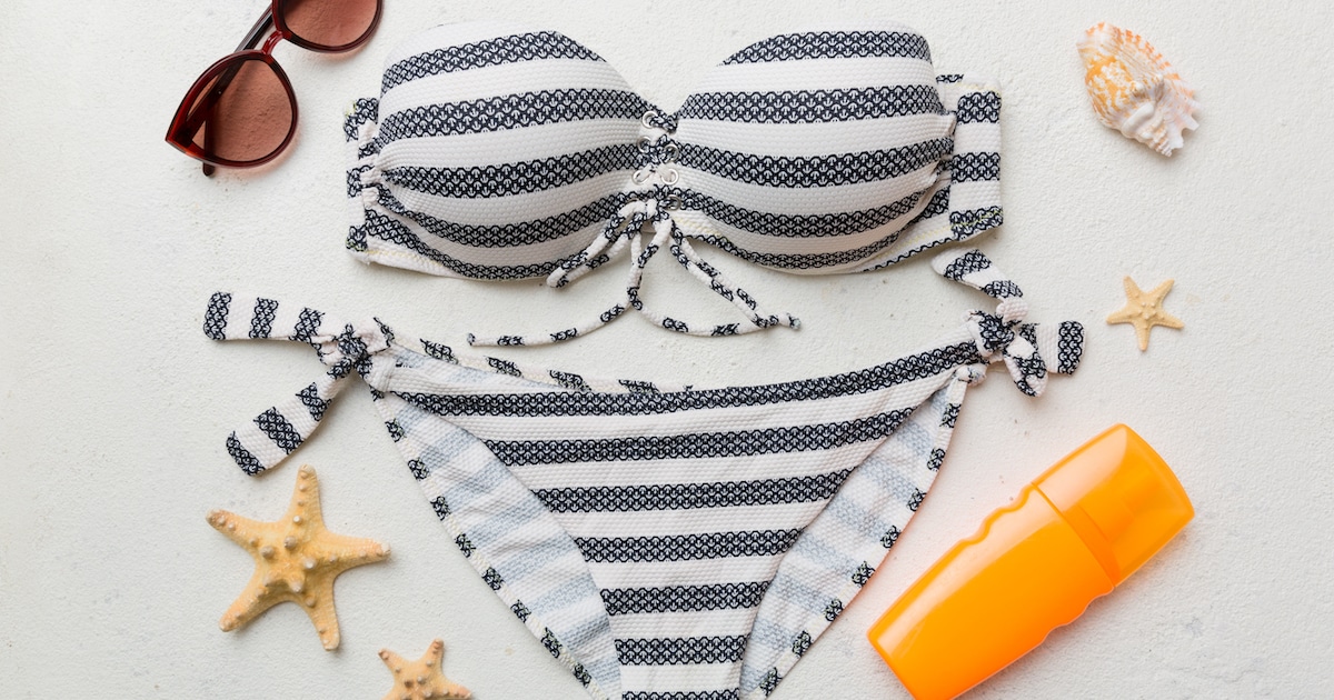 woman-swimwear-beach-accessories-flat-lay-top-view-colored-background-summer-travel-concept-bikini-swimsuit-straw-hat-seasheels-copy-space-top-view
